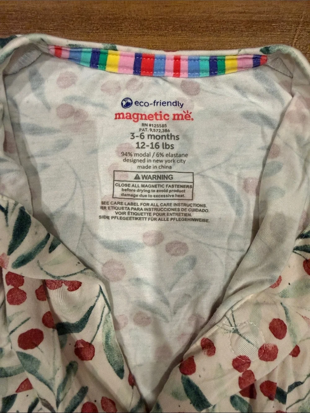 MagneticME 3-6M Long Sleeve Footie Pajamas in Cream with Red Berry Print